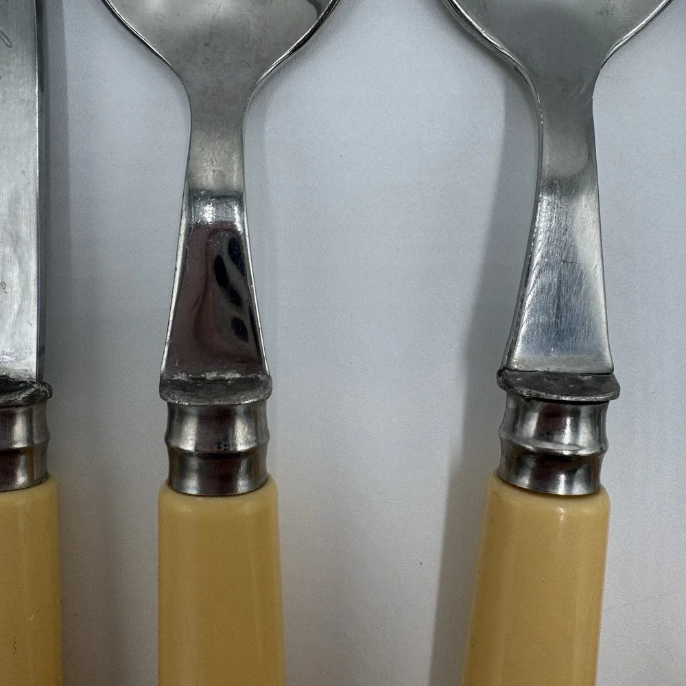 Jean Dubost Yellow Flatware 8 Pc Lot Stainless France Knives Spoons